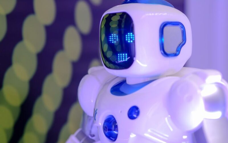 Modern toy robot with LED facial display, showcasing advanced technology and innovation.