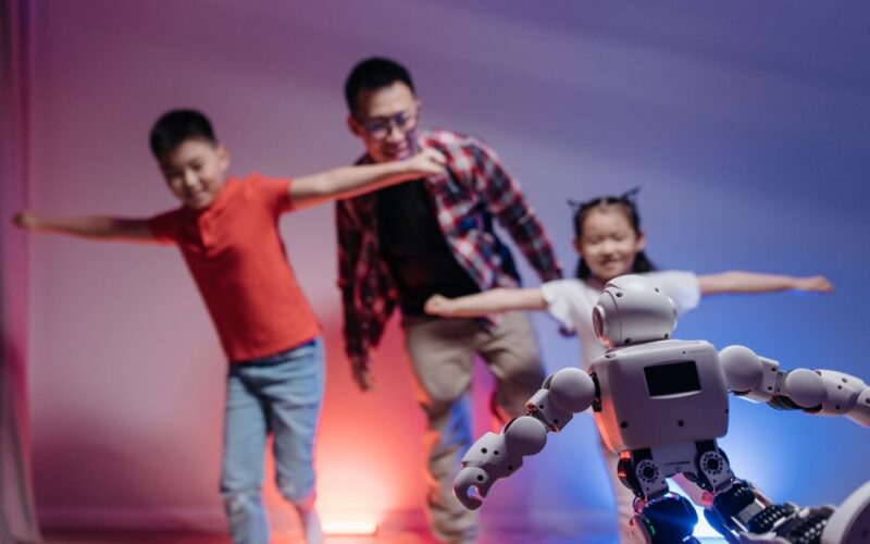 Joyful family interaction with a futuristic robot enhancing modern technology experiences.