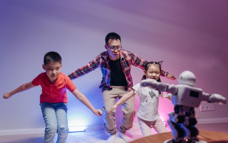 Family enjoying playful interaction with a modern robot toy at home.