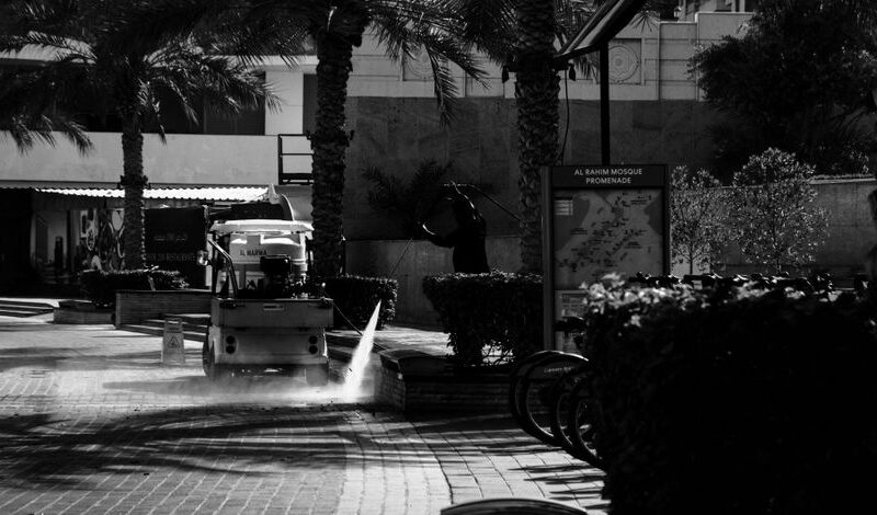 Black and white photo of street cleaning at Al Rahim Mosque Promenade, Dubai