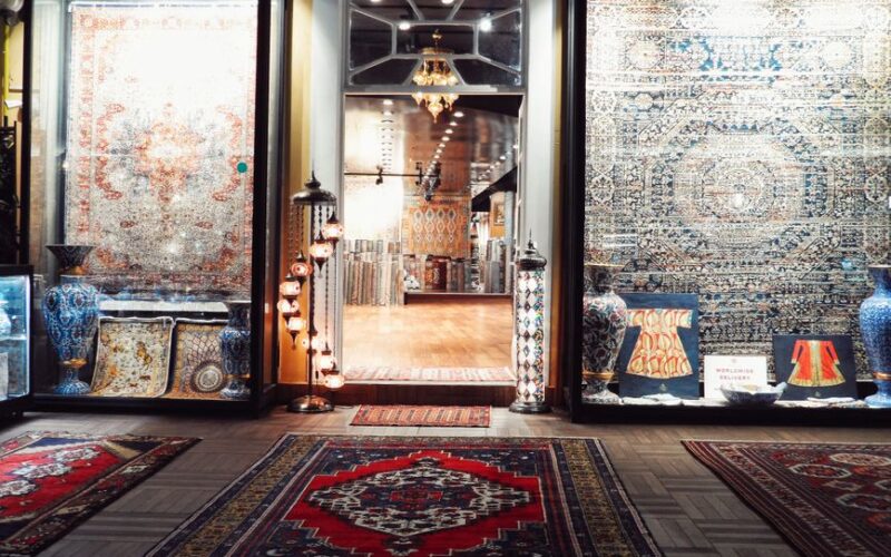 Showcasing intricate Persian rugs and decorative vases at an upscale boutique.