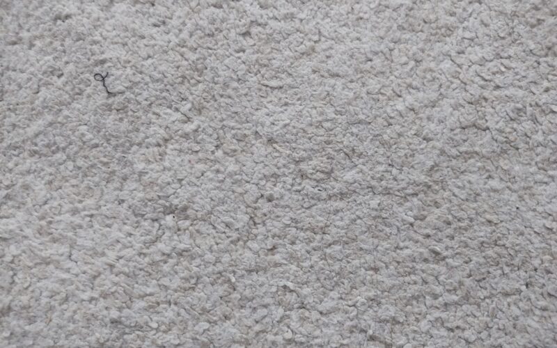 a close up view of a gray carpet